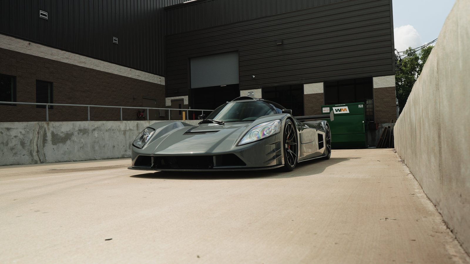 A parked car shot front three quarter, the frame the shot list came out of